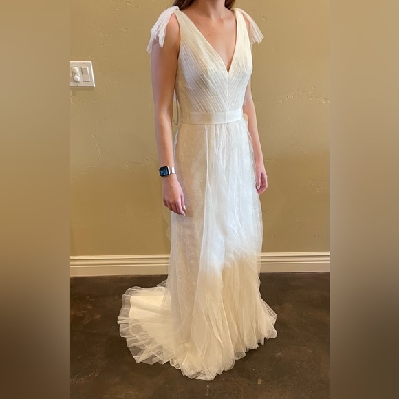 Beautiful Vera Wang wedding dress from David’s Bridal. Model is a size 0-2. - Picture 5 of 6